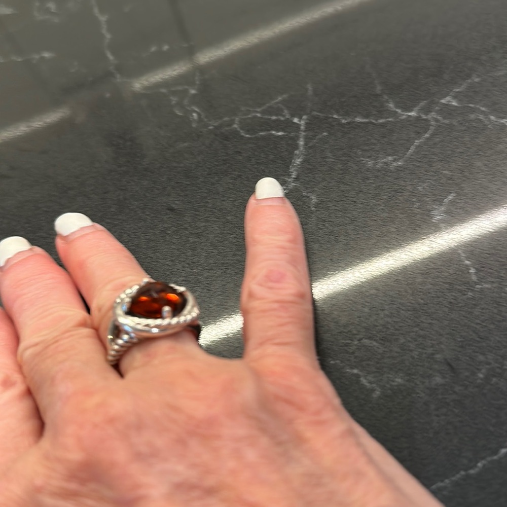 Silver and garnet ring.